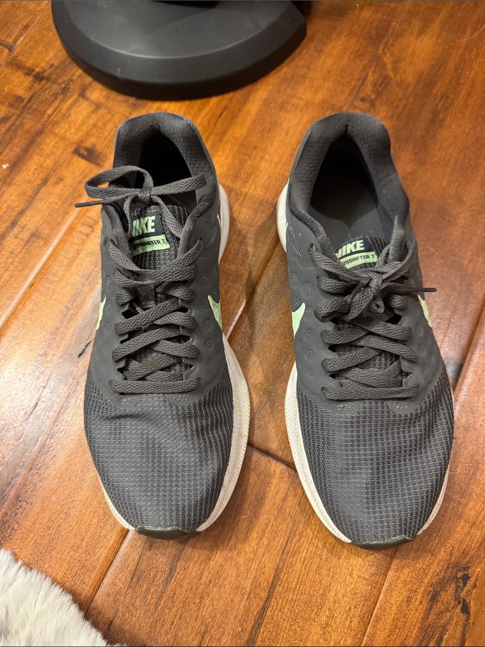 Nike Black Running Shoes with Light Green Swoosh